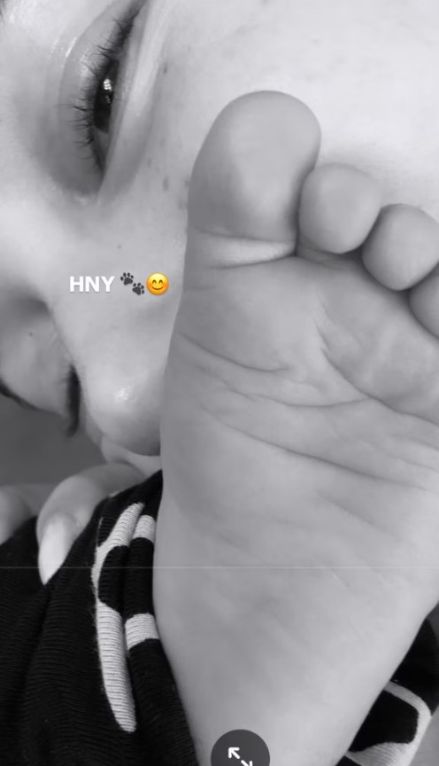 hailey bieber kisses jack bieber's toes